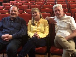 Rachel Reim-Ledbetter (center), with Lincoln Theatre Development Director Damond Morris (left) and Executive Director Roger Roger Gietzen sitting in the Lincoln Theatre