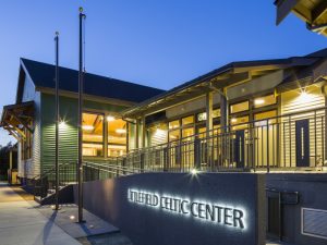 Littlefield Celtic Center building lit up at night