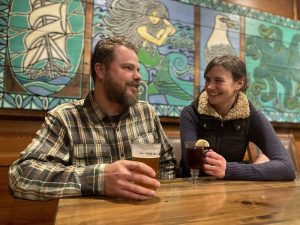 Ben and Erin Braudrick enjoy an evening nightcap at the Creekside Restaurant located at the Kalaloch Lodge