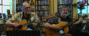 Whateverly Brothers playing guitars