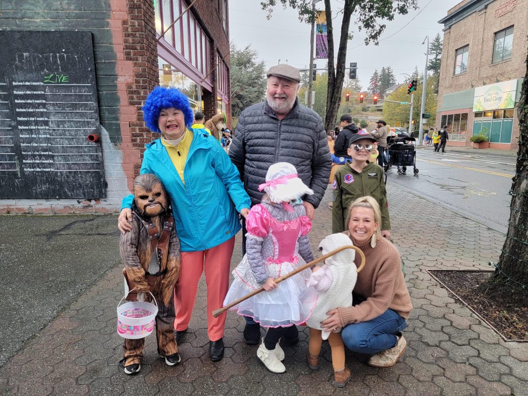 a family dressed up in various costumes for Halloween in Mount Vernon