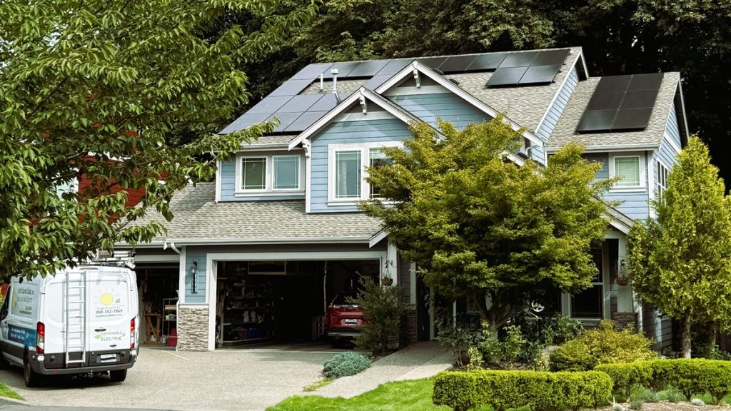 a house with solar panels on the roof