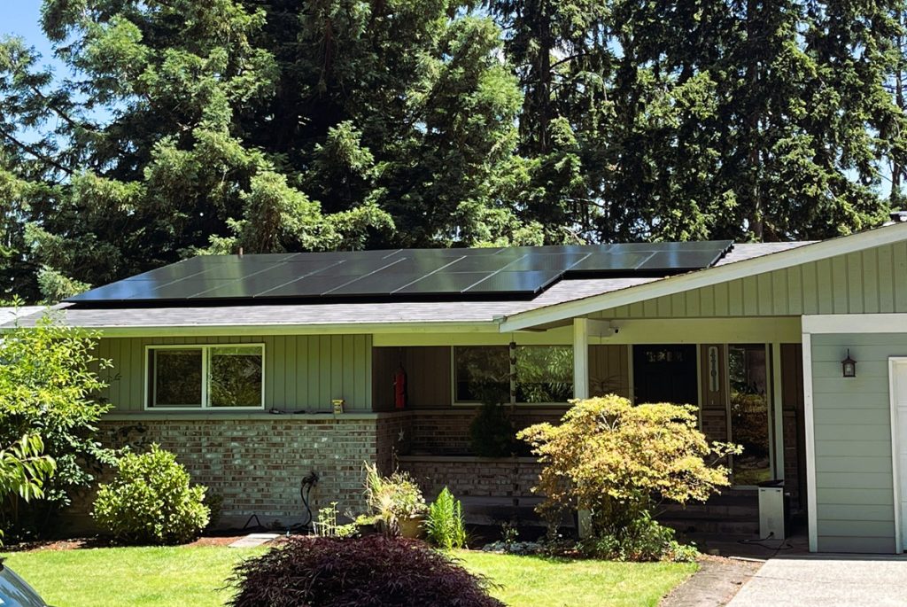a house with solar panels on the roof