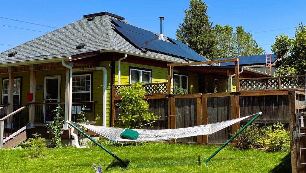 a house with solar panels on the roof